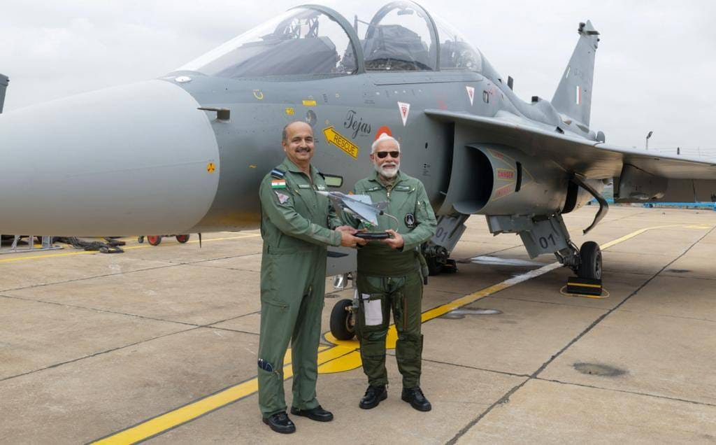 'PM Flies in the indigenously designed, developed and manufactured twin seater fighter aircraft LCA Tejas'